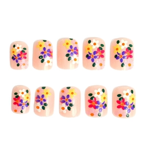 Short square press-on nails featuring sweet floral patterns on a nude base color