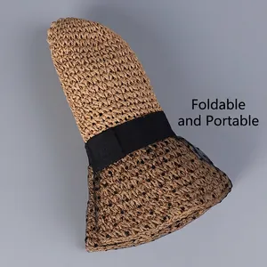Foldable handmade straw sun hat with black lace mesh and elegant ribbon bow detail