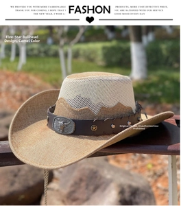 Detail of camel straw cowboy hat with metallic bull head buckle and star rivets