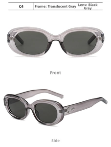 Detail view of oval grey sunglasses with silver star accents on the front and side frame
