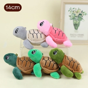 Five 14cm colorful sea turtle plush keychains displayed on a stylish glass stand
