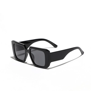 Classic black Y2K oversized square sunglasses with thick glossy frames and dark lenses