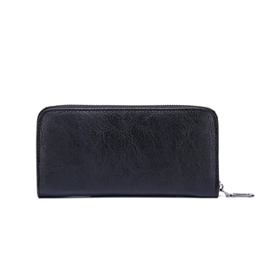 Close-up of black long leather wallet with silver zipper and oil wax texture detail