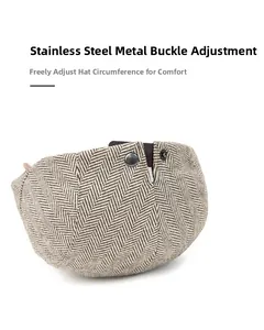 Detail of adjustable stainless steel buckle on herringbone newsboy hat for men