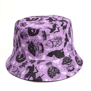 Detail of purple canvas bucket hat featuring mystical mushroom and skull prints