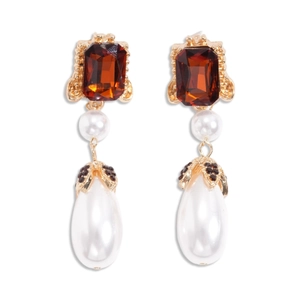 Vintage gold earrings with amber square stones and pearl drops on a white background