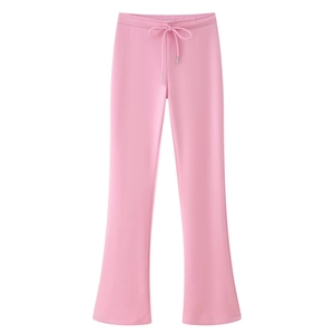 Detail of light pink wide-leg drawstring pants in lightweight breathable woven fabric