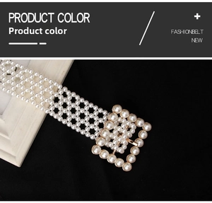 Macro shot of elegant four-row pearl belt with square pearl-encrusted buckle