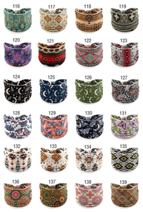 Collection of 24 colorful African print elastic headbands with diverse ethnic patterns