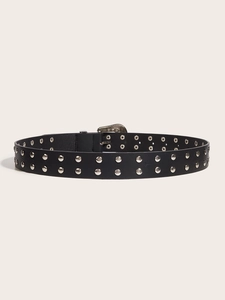 Detail of black punk leather belt with double-row silver metal studs and eyelets