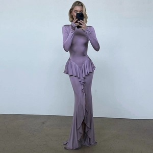 Detail view of purple maxi dress with ruffle accents and side slit for a stylish look