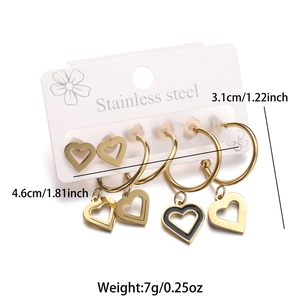 Detailed view of golden stainless steel heart earring set with dimensions and weight info