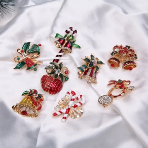 Detailed set of eight festive Christmas brooches with colorful enamel and sparkling rhinestones