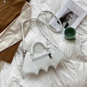 Detailed back view of white PU leather bat bag with functional zipper pocket and strap