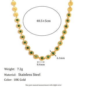 Vintage 18K gold plated stainless steel necklace with green stone charms on white background