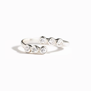 Elegant S925 sterling silver open ring featuring six brilliant round-cut zircon stones
