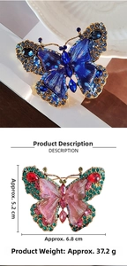 Detailed size view of vintage butterfly brooches with crystal inlay and gold finish