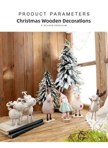 Detailed Christmas wool felt reindeer and Santa Claus figurines on a rustic wooden desk