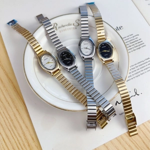 Elegant oval quartz watches with metal link bracelets in gold and silver finishes