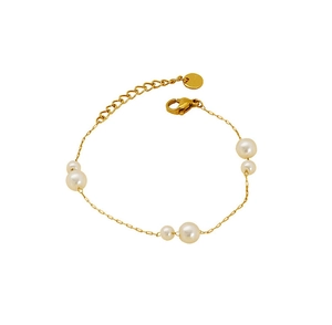 Detailed macro view of gold-plated stainless steel pearl bracelet with adjustable clasp