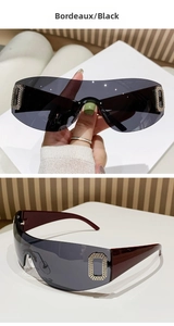 Detail of Y2K rimless sports sunglasses with Bordeaux temples and rhinestone accents