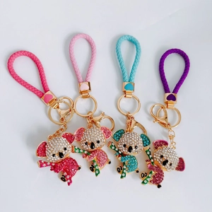 Cute koala keychains with rhinestones and braided leather straps in four vibrant colors