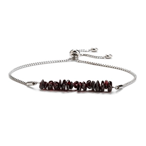 Detail of adjustable stainless steel square chain with red gravel beads and slider clasp