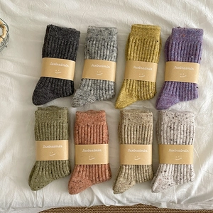 Set of 8 pairs thick wool blend socks in assorted colors with cozy knit texture