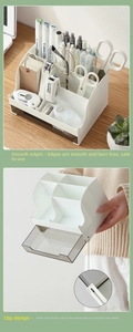 Detail of drawer safety buckle and smooth edges on the white desktop storage box