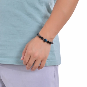 8mm faceted natural tiger eye stone and black magnetic crystal beaded bracelet on wrist