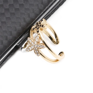 Minimalist adjustable star ring with white and black zircon stones in gold finish