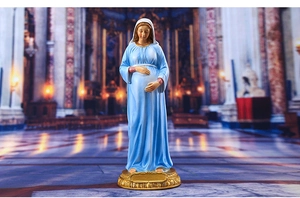 Detail showing the pregnant Virgin Mary resin statue in blue robe on a gold base