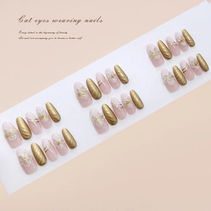 Press-on nails with champagne gold foil, 3D floral relief and cat eye shimmer texture