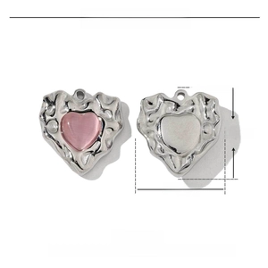 Detail view of pink natural stone heart pendant with stainless steel frame specifications