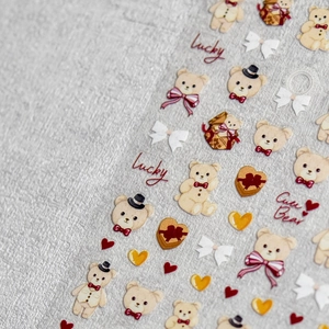 Self-adhesive cute teddy bear nail art stickers with red bows and lucky motifs