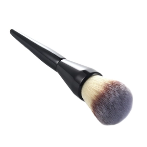 Large powder makeup brush with fluffy gradient bristles and sleek black handle