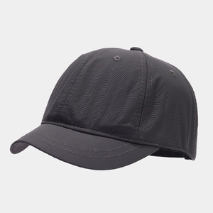 Detailed side view of quick-dry baseball cap in dark grey with short brim and air vents