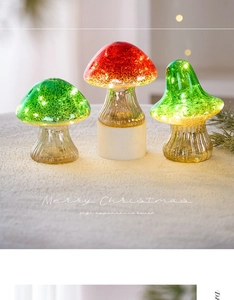 Glow glass mushroom Christmas ornaments set of three on a cozy plush white surface