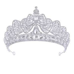 Elegant silver bridal crown with shimmering clear crystals on a white background