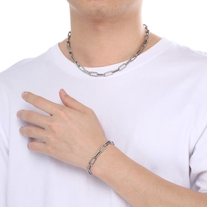 Silver stainless steel paperclip chain necklace and bracelet set for men on model
