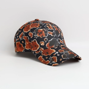 Unisex tie-dye baseball cap with brown and black abstract spot print for outdoor sun protection