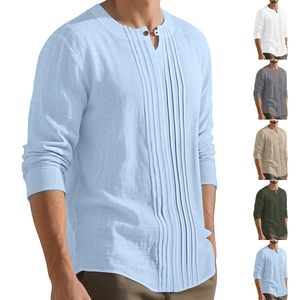 Detailed macro view of the linen fabric texture and buttoned neckline of the men shirt