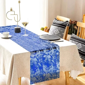 Elegant blue polyester mesh table runner with metallic silver foil patterns for wedding decor