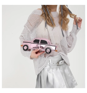 Pink toy car shaped shoulder bag with checkered racing stripes and silver chain strap