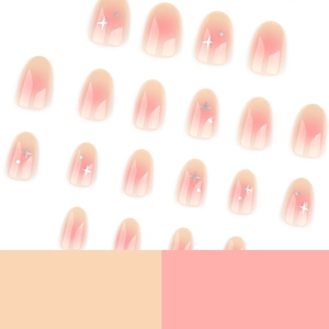 Pink blush gradient press-on nails with silver star designs and glossy round oval finish