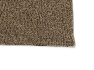 Close-up of brown knit fabric edge showing detailed rolled hem and textured stitching