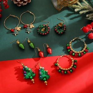 Set of 6 Christmas earrings with snowman tree and bell designs in festive colors