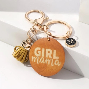 Handmade khaki wooden keychain with tassel and engraved GIRL mama slogan charm