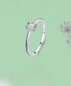 Detail view of S925 sterling silver stamp and rectangular cubic zirconia stone setting