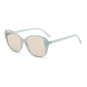 Oversized light blue translucent frame sunglasses with light brown lenses from a side view